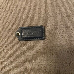 Coach Navy Leather tag